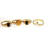 Four 9ct gold rings, two children's rings set with black stone,