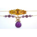 An Edwardian 9ct gold mourning brooch set with purple stone and seed pearls and a yellow metal