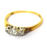 A 9ct gold three stone diamond ring, size L, approx 2.5g.