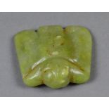 A Chinese carved jade eagle pendant with ring holes to the reverse, width 5.5cm.