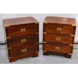 A pair of Eastern hardwood small side chest of drawers with brass inlay and inset ornamental brass