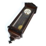 A late 19th early 20th century mahogany cased Vienna style wall clock of small proportions,