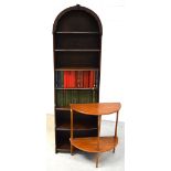 A 20th century slim oak bookcase of simple form with dome top, width 54cm,