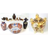 An Oriental collectors lot comprising two cloisonné vases, one blue ground with floral decoration,