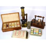 A 19th century rosewood miniature sewing stand with turned bobbin holder and vacant spaces for pin