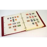 A quantity of Australian stamps dating between 1913 and 1951 in a printed album to include good