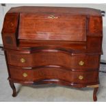 An elegant reproduction serpentine front bureau, fall front with fitted interior, width 85cm.