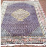 A fine Persian Ardebil carpet, 259 x 165cm.