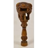 A late 19th/early 20th century Black Forest carved oak figural nutcracker, height 16.5cm (af).