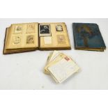 A Victorian leather bound photograph album containing various portrait photographs,
