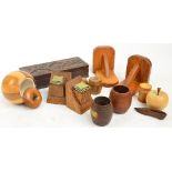 A small collection of treen to include a floral carved trinket box of rectangular form, 27.