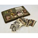 A quantity of early 20th century postcards including greetings postcards for birthday, Christmas,