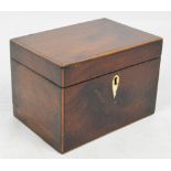 An early 19th century mahogany and boxwood strung simple rectangular two division tea caddy,