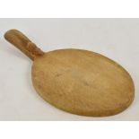 A Robert "Mouseman" Thompson of Kilburne wooden cheese board, length 37cm.