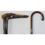 A hallmarked silver mounted ebonised walking stick,