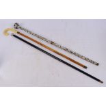 An early 20th century ebonised cane with a hallmarked silver knob, length 92cm,