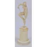 A late 19th century/early 20th century Continental carved ivory figure depicting Aphrodite stopping