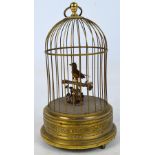 An early 20th century bird in a birdcage automaton,