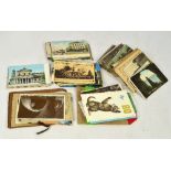 A quantity of predominantly early 20th century postcards comprising mainly real photo topographical