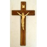 A late 19th century carved sectional ivory and brass inlaid and backed rosewood crucifix, 41 x 21.