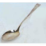 A very large early 20th century Danish silver basting spoon with stylised Art Nouveau scroll