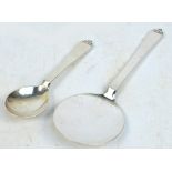 GEORG JENSEN; a hallmarked silver jelly server and spoon in the "Pyramid" pattern,
