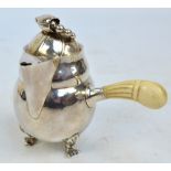 GEORG JENSEN; a silver and ivory handled chocolate pot in the "Blossom" pattern,