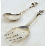 GEORG JENSEN; a pair of silver salad servers in the "Blossom" pattern also known as "Magnolie", no.