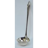 GEORG JENSEN; a small hallmarked silver double lipped sauce ladle in the "Akkeleje" pattern,