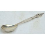 GEORG JENSEN; a silver dessert spoon with pierced finial depicting the Copenhagen coat of arms,