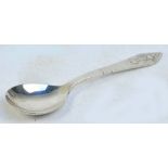 GEORG JENSEN; a hallmarked silver spoon in the "Fuschia" pattern, also known as "Klokke",