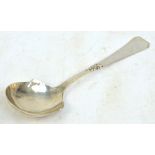 FRITZ S HEINBUGER; a Danish silver serving spoon with part hammered shaped bowl and angled handle,