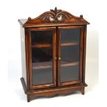 A miniature twin glazed door apprentice cabinet makers bookcase/display cabinet,