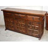 An early 20th century Jacobean style sideboard,