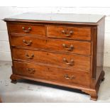 An 18th century mahogany glass topped two over three chest of drawers with quarter reeded column