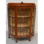 A retro astragal glazed display cabinet with interior shelving on ball and claw feet, width 100cm.