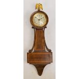 An early 20th century American wall clock,