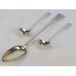 A pair of George III hallmarked silver Old English pattern ladles with plain circular bowls,