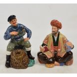 Two Royal Doulton figures; HN2247 "Omar Khayyam" and HN2317 "The Lobster Man".