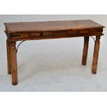 An elm hall table with stud decoration and two frieze drawers above four turned supports,