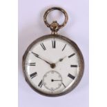 A Victorian hallmarked silver key wind open faced pocket watch with white enamel dial set with