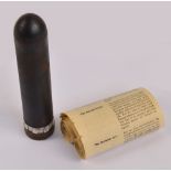 A WWII "bullet" containing propaganda dropped from German war planes, length 15cm.
