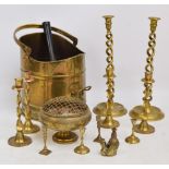 A brass coal bin, shovel, four pairs of brass candlesticks and a brass bowl with pierced cover.