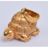 An Italian 18ct yellow gold pendant modelled as a tortoise, hallmarked to the suspension ring,