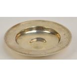 An Elizabeth II hallmarked silver circular dish of plain form with domed centre and wide rim,
