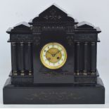 A late 19th century French black slate mausoleum mantel clock,