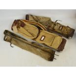 Three canvas and leather golf bags, one heavily distressed (3).
