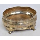 A Victorian hallmarked silver mounted and walnut condiment stand of oval bellied form with wavy