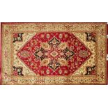 A red ground Heriz carpet, 280 x 200cm.