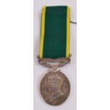 A George VI Territorial Efficiency Medal with Southern Rhodesia bar awarded to C.R.1100T/Sgt. Cyril.